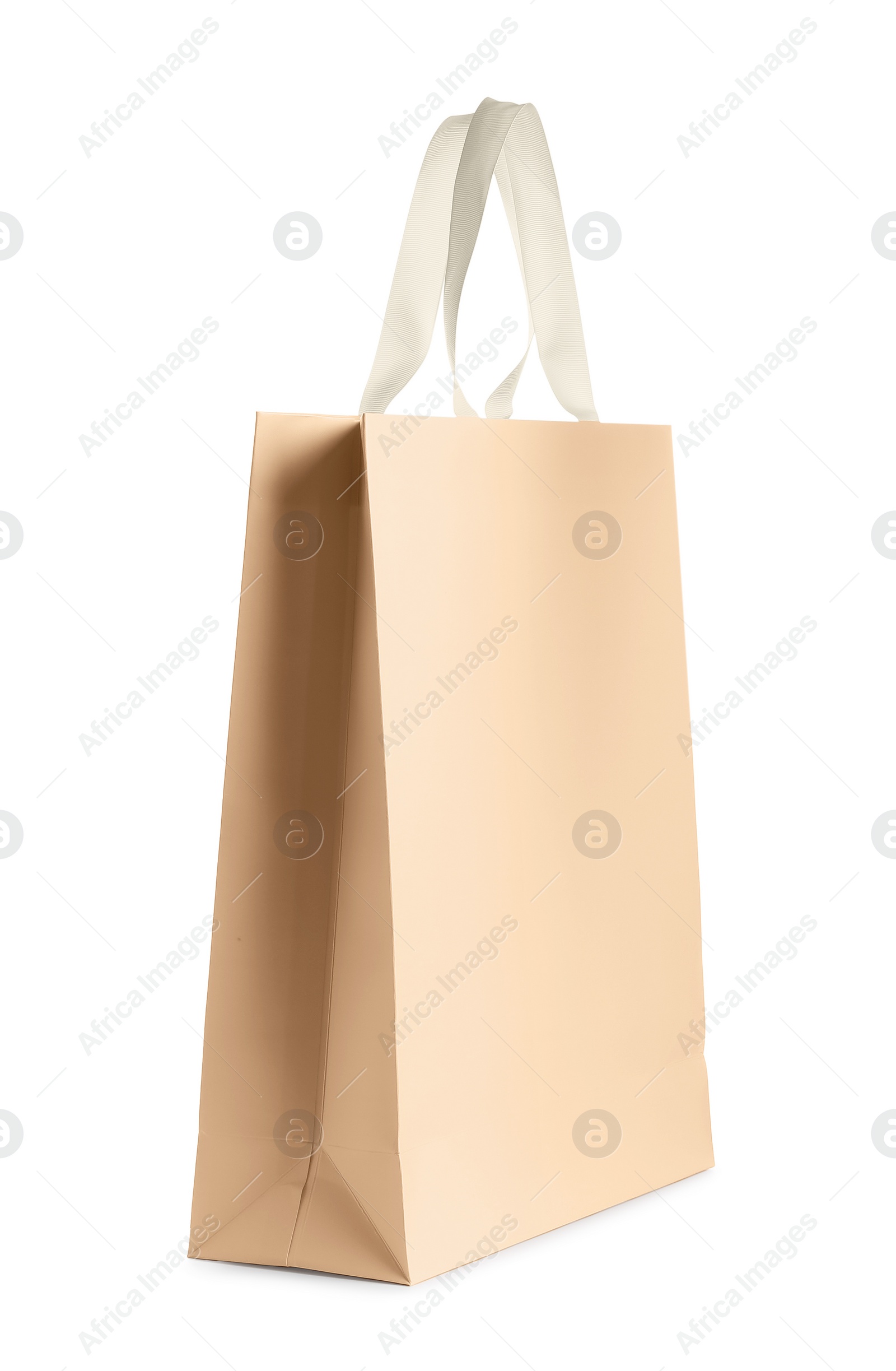 Photo of One paper bag isolated on white. Mockup for design