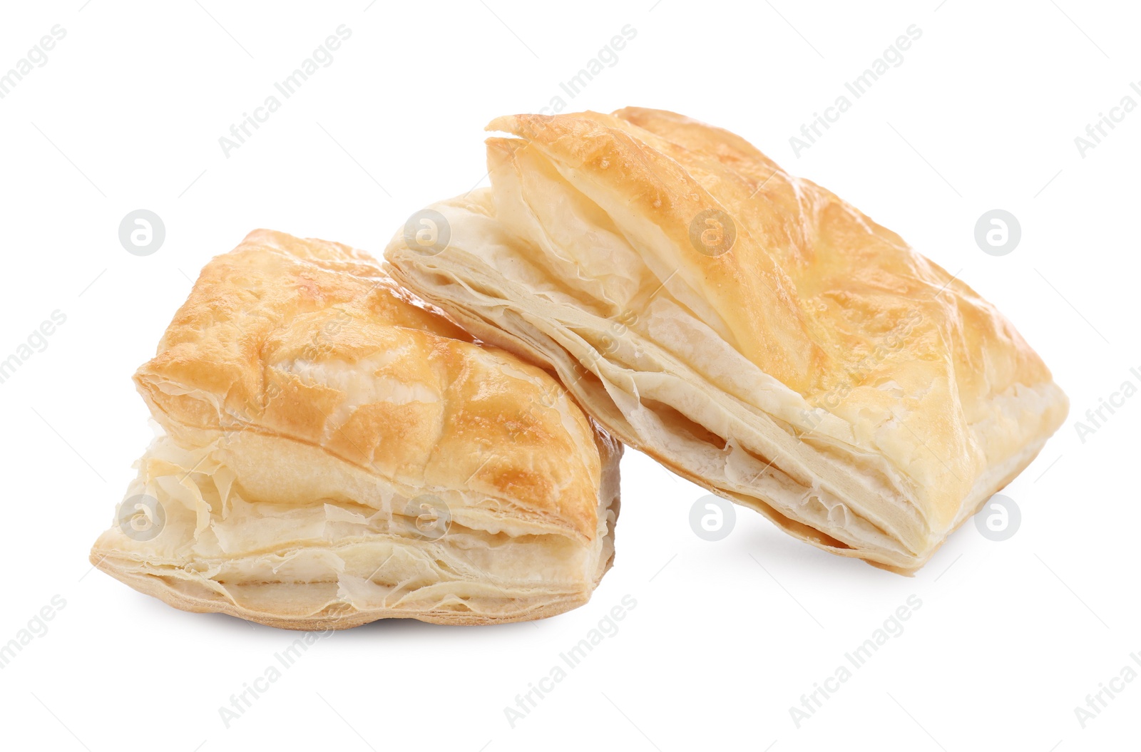 Photo of Delicious fresh puff pastries isolated on white