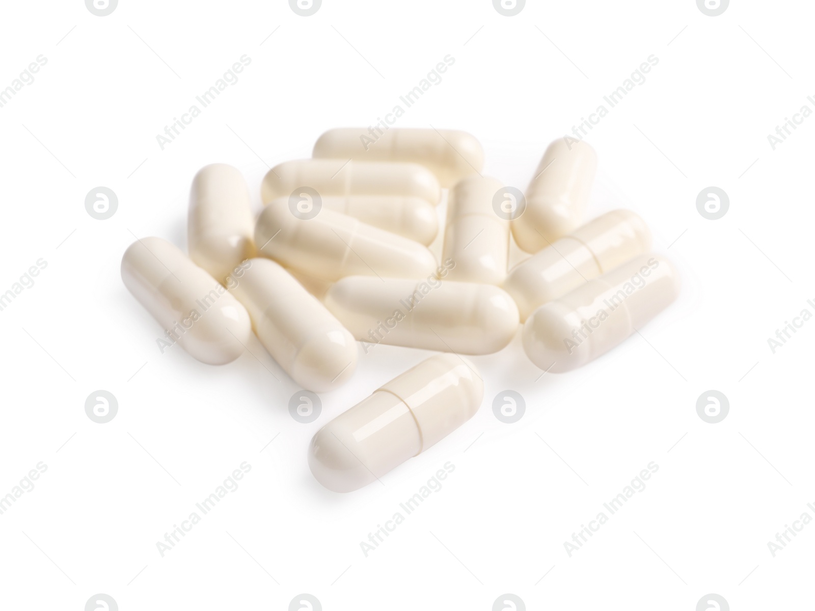 Photo of Many pills isolated on white. Medicinal treatment