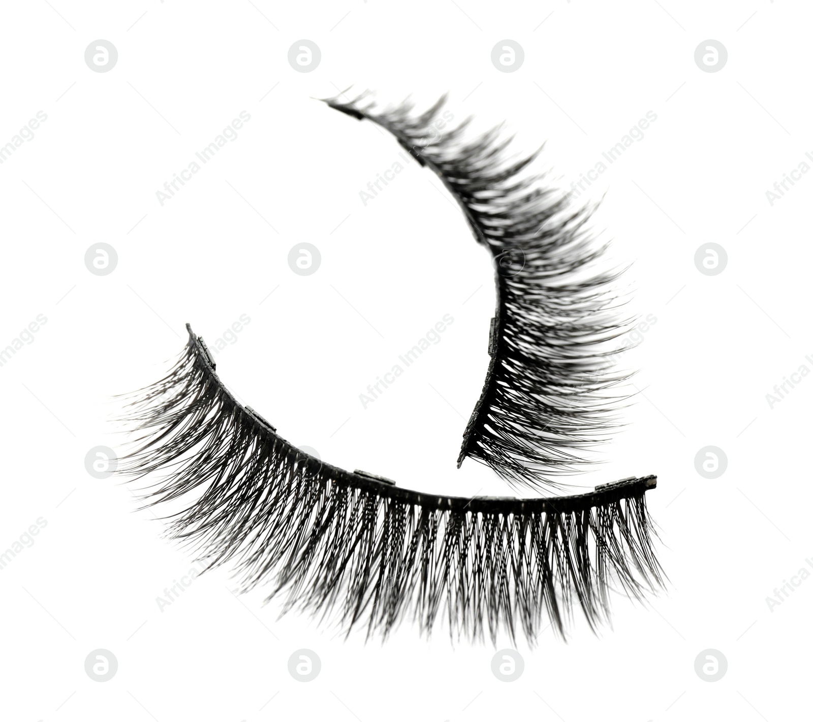 Photo of Pair of magnetic eyelashes on white background