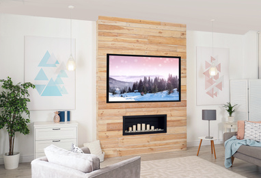 Image of Living room interior with modern TV on wooden wall