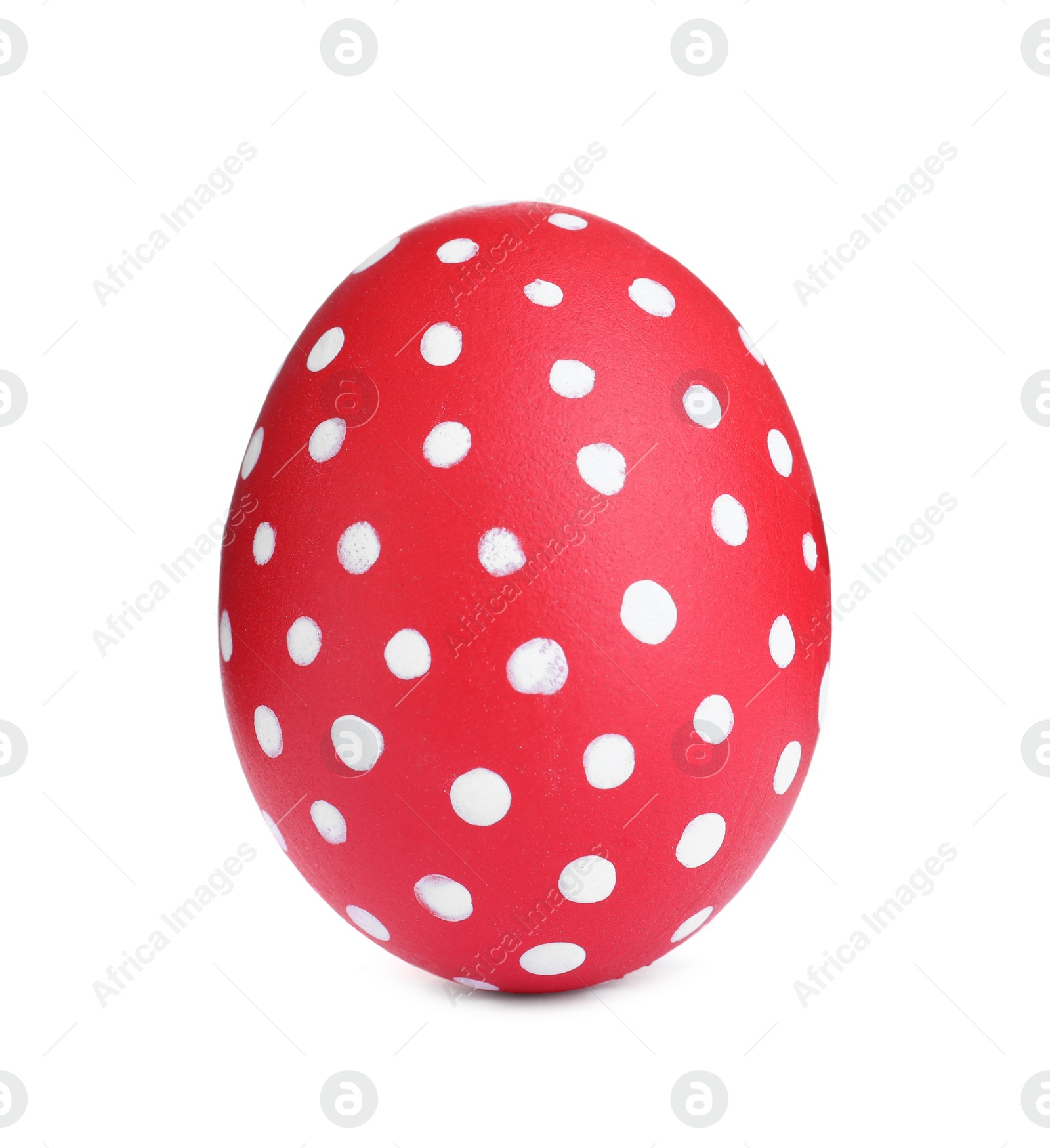Photo of Painted red egg with dot pattern isolated on white. Happy Easter