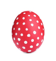Photo of Painted red egg with dot pattern isolated on white. Happy Easter