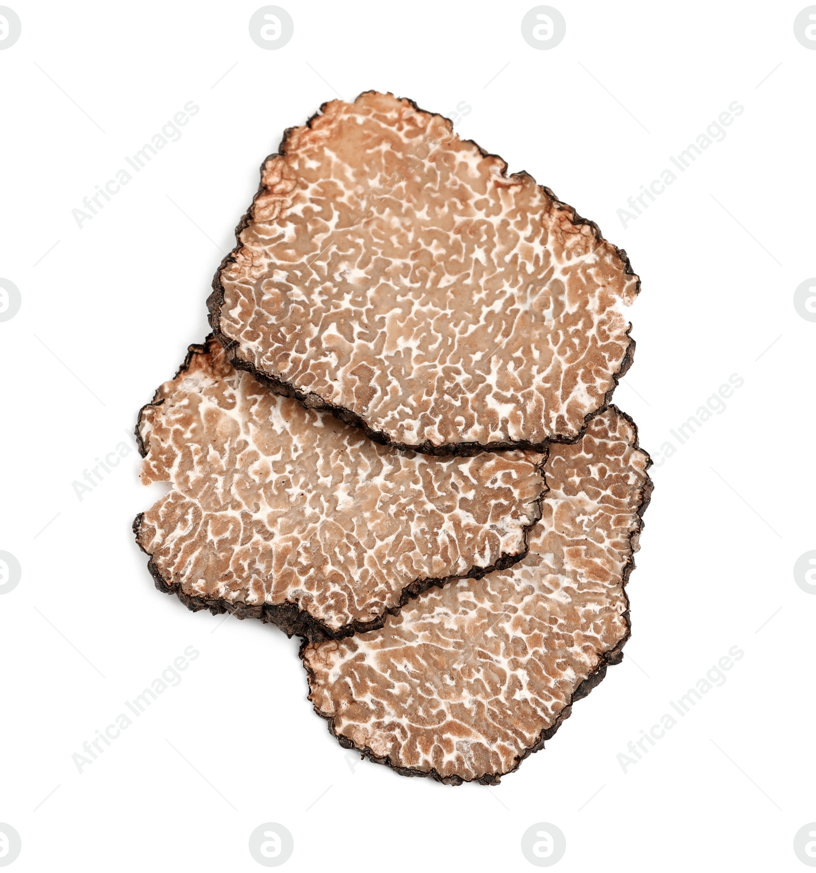 Photo of Slices of black truffle isolated on white, top view