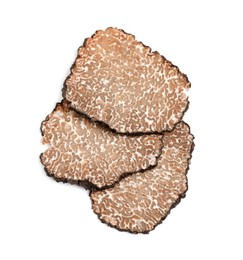 Slices of black truffle isolated on white, top view