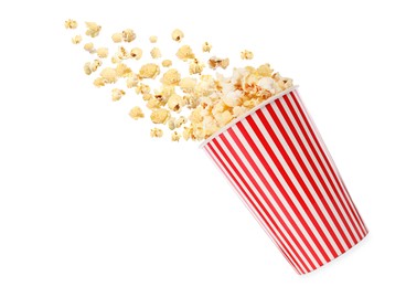 Image of Popcorn flying into bucket on white background