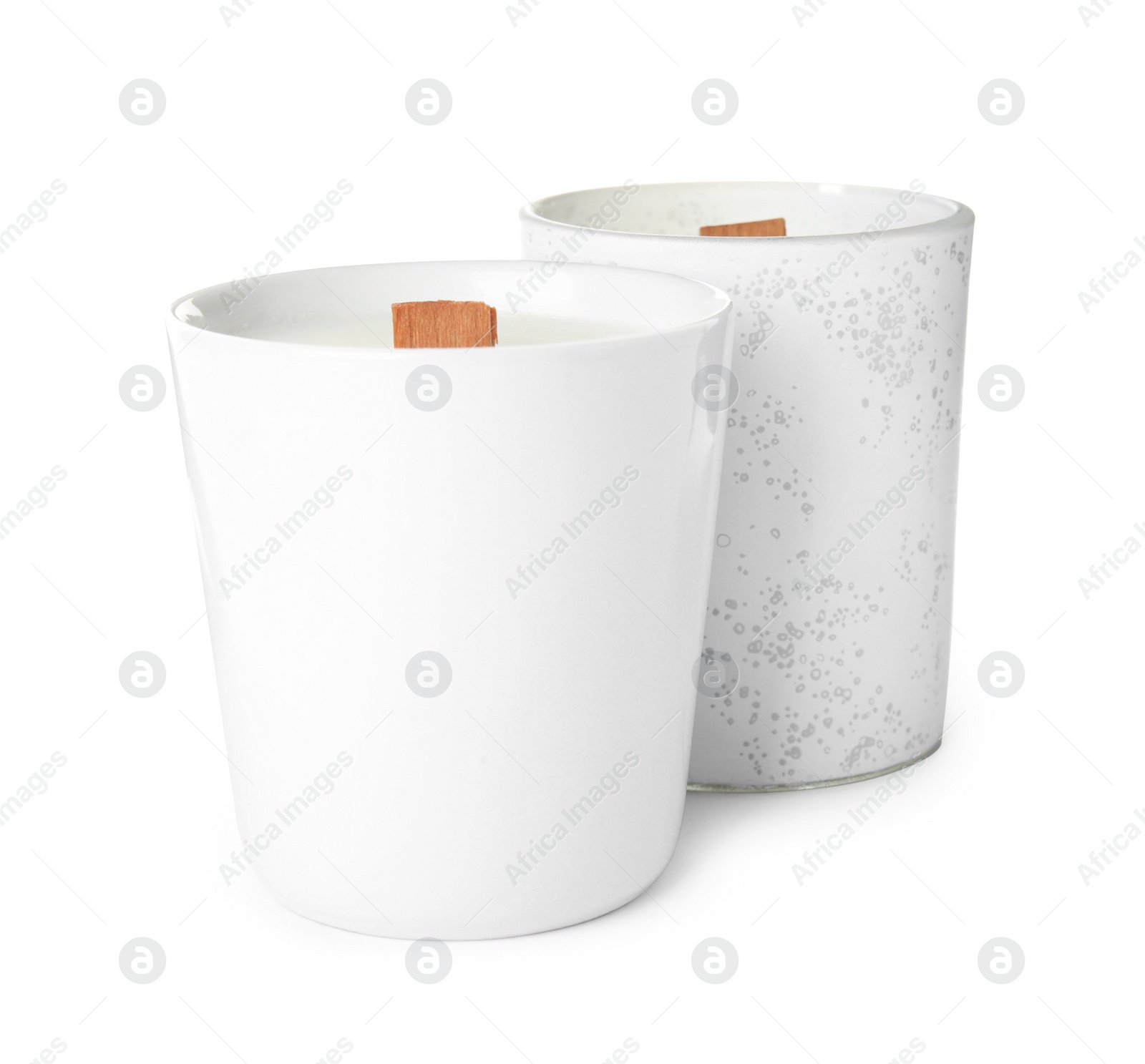 Photo of Beautiful candles with wooden wicks on white background