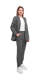 Photo of Beautiful happy businesswoman in suit on white background