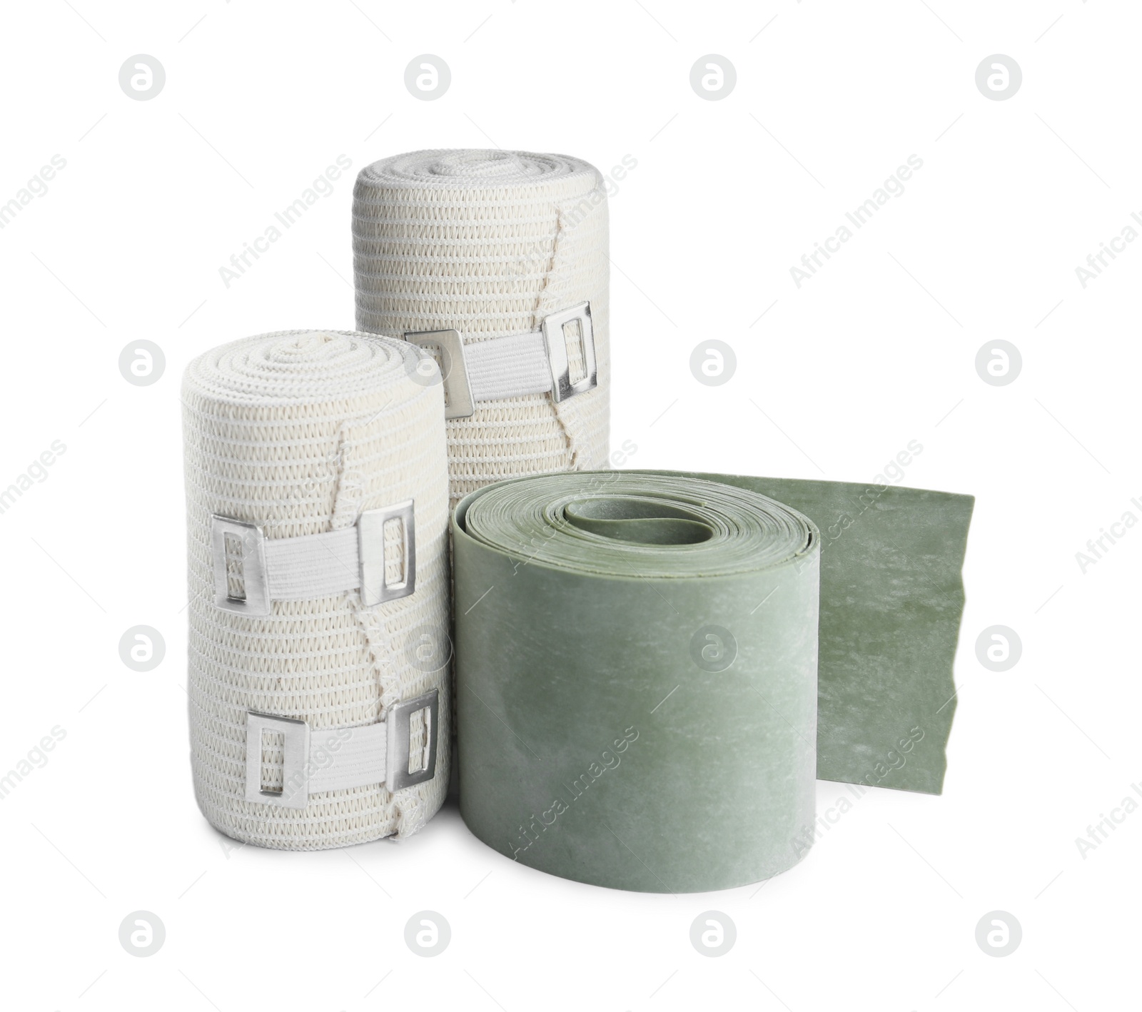 Photo of Medical bandage rolls on white background. First aid items