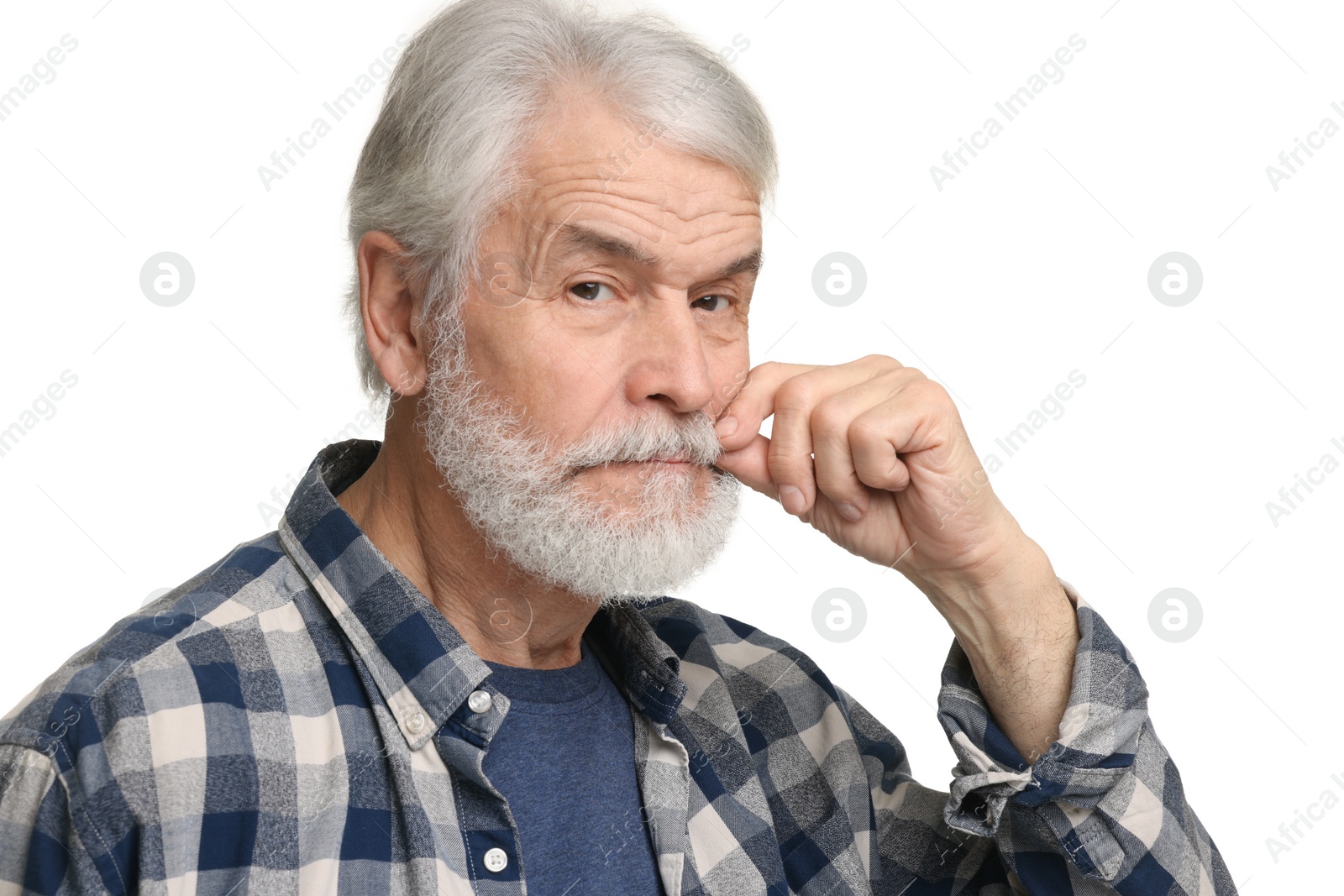 Photo of Senior man touching mustache on white background