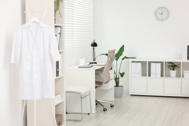 Photo of Modern medical office with doctor's workplace in clinic