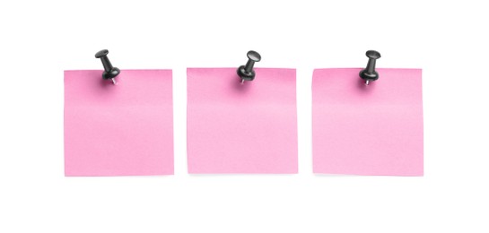 Photo of Blank pink notes with black pins on white background, top view. Space for text