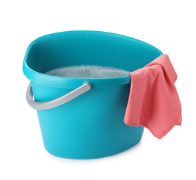 Photo of Turquoise bucket with detergent and rag isolated on white