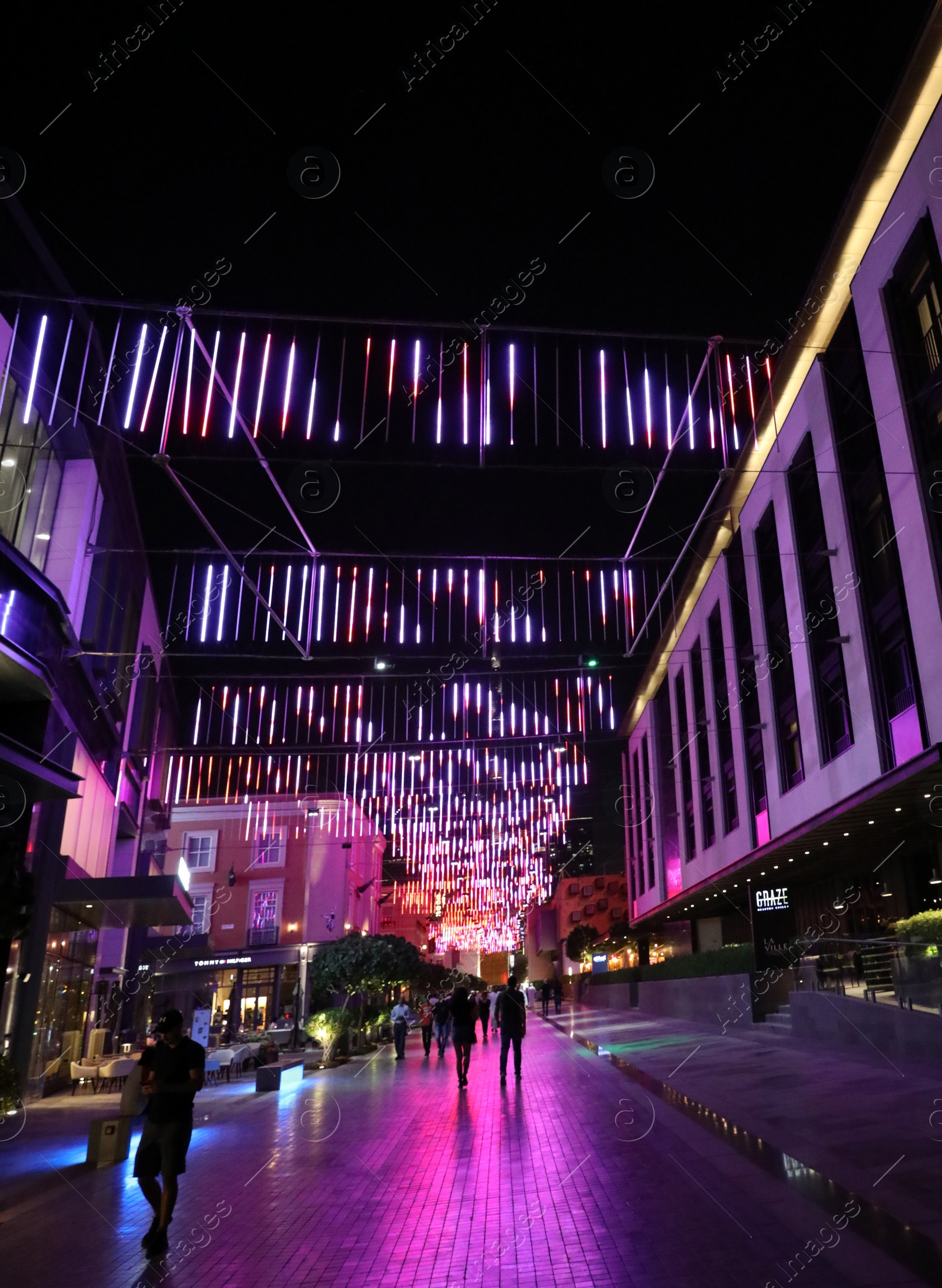 Photo of DUBAI, UNITED ARAB EMIRATES - NOVEMBER 04, 2018: Beautiful view of illuminated street at night