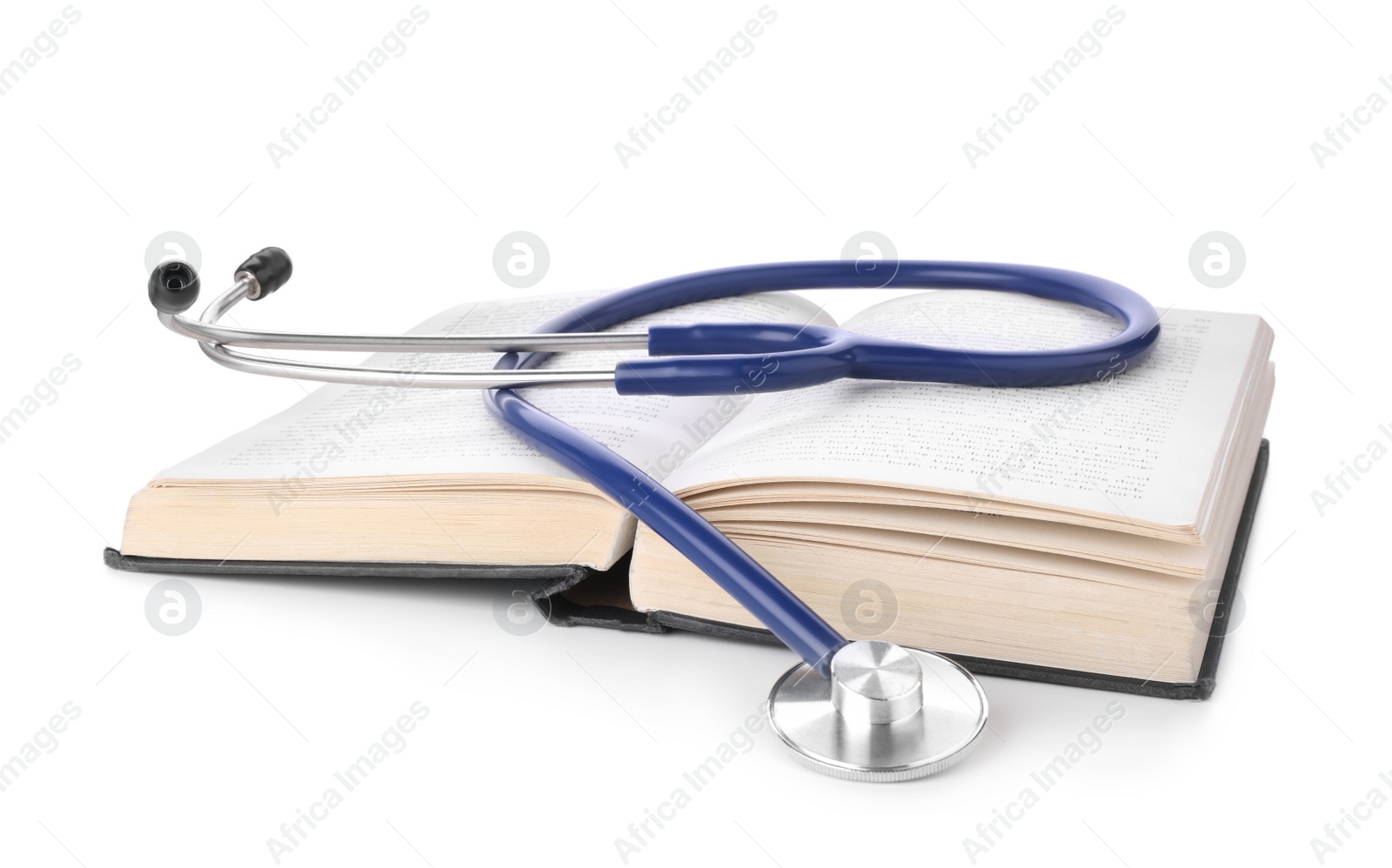 Photo of Open student textbook and stethoscope on white background. Medical education