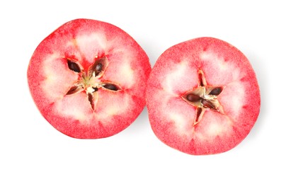 Cut tasty apple with red pulp isolated on white, top view