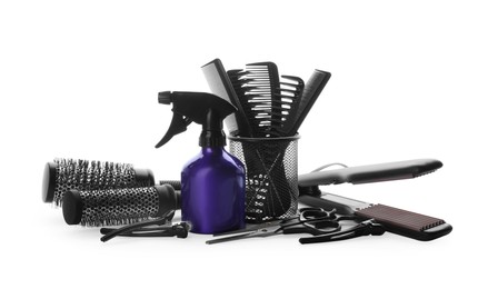 Photo of Different professional hairdresser tools on white background