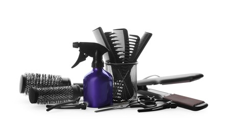 Different professional hairdresser tools on white background