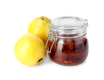 Photo of Quince jam in glass jar and fresh raw fruits isolated on white