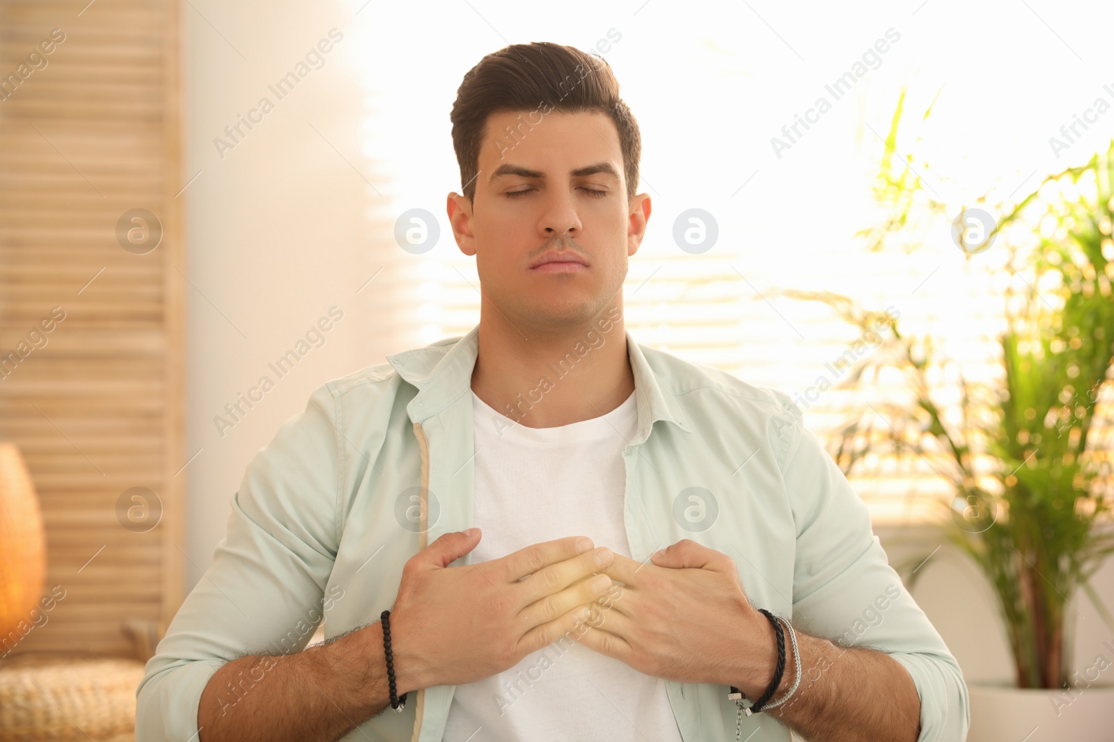 Photo of Man during self-healing session in therapy room