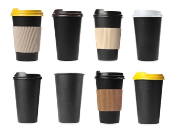 Image of Set with different paper coffee cups on white background 