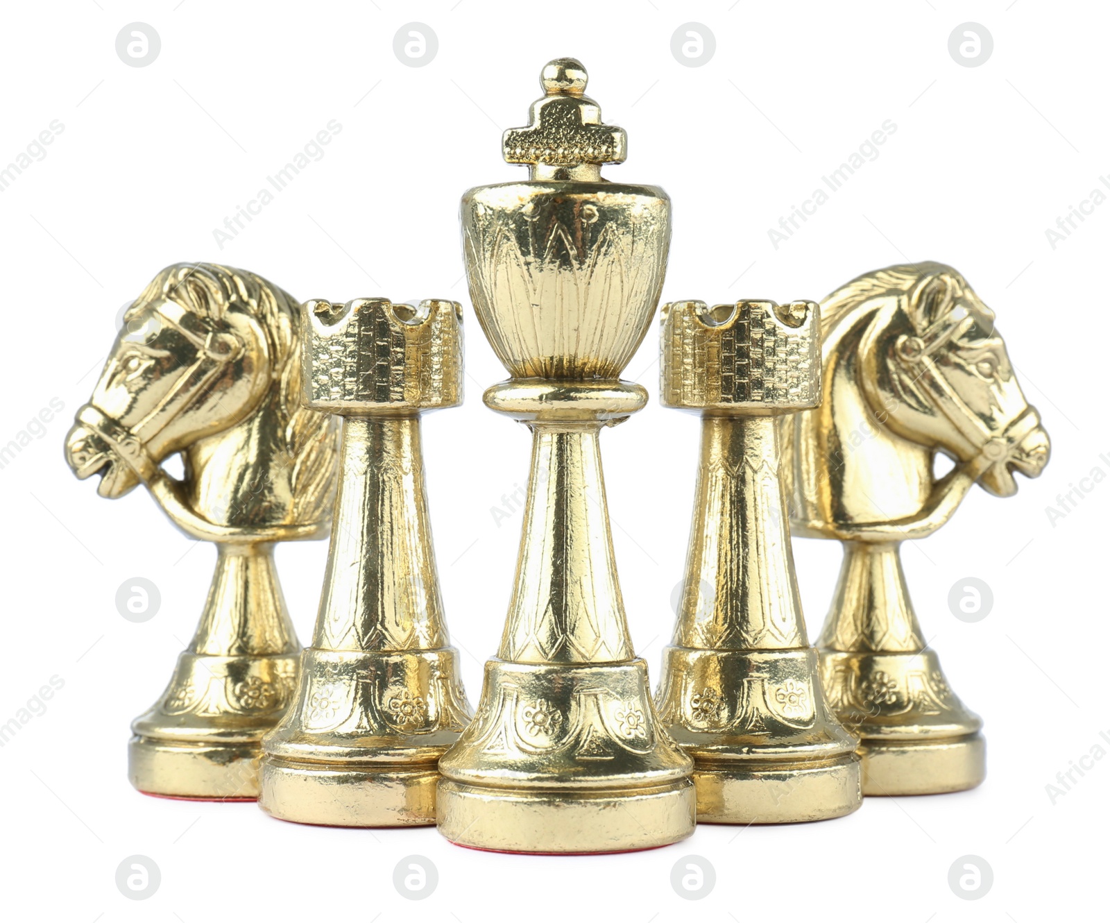 Photo of Set of golden chess pieces on white background