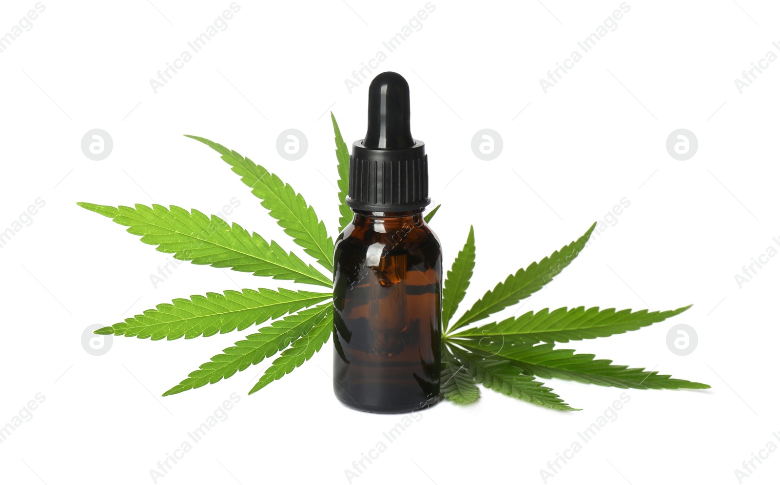 Photo of Bottle of CBD oil or THC tincture and hemp leaves on white background