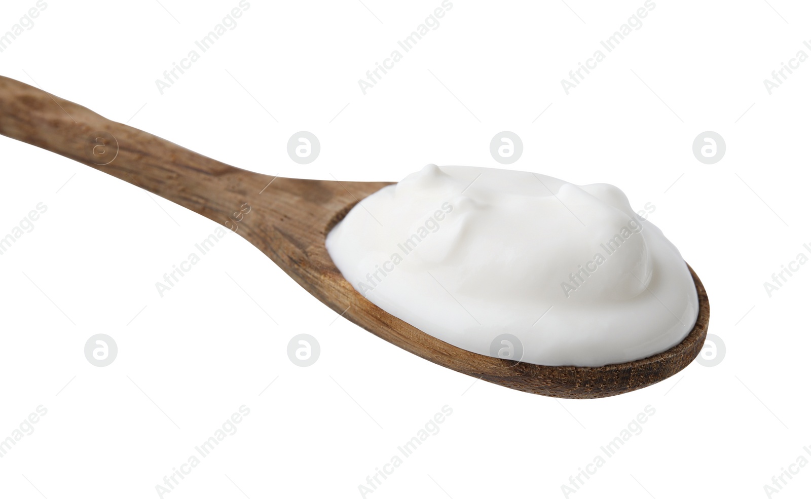 Photo of Delicious natural yogurt in spoon isolated on white