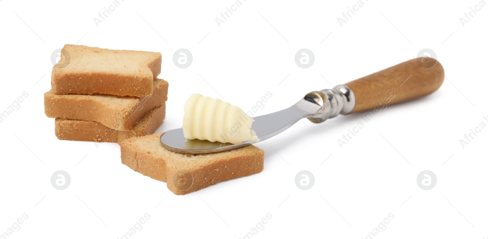 Photo of Butter curl, knife and pieces of dry bread isolated on white