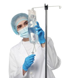 Photo of Nurse setting up IV drip on white background