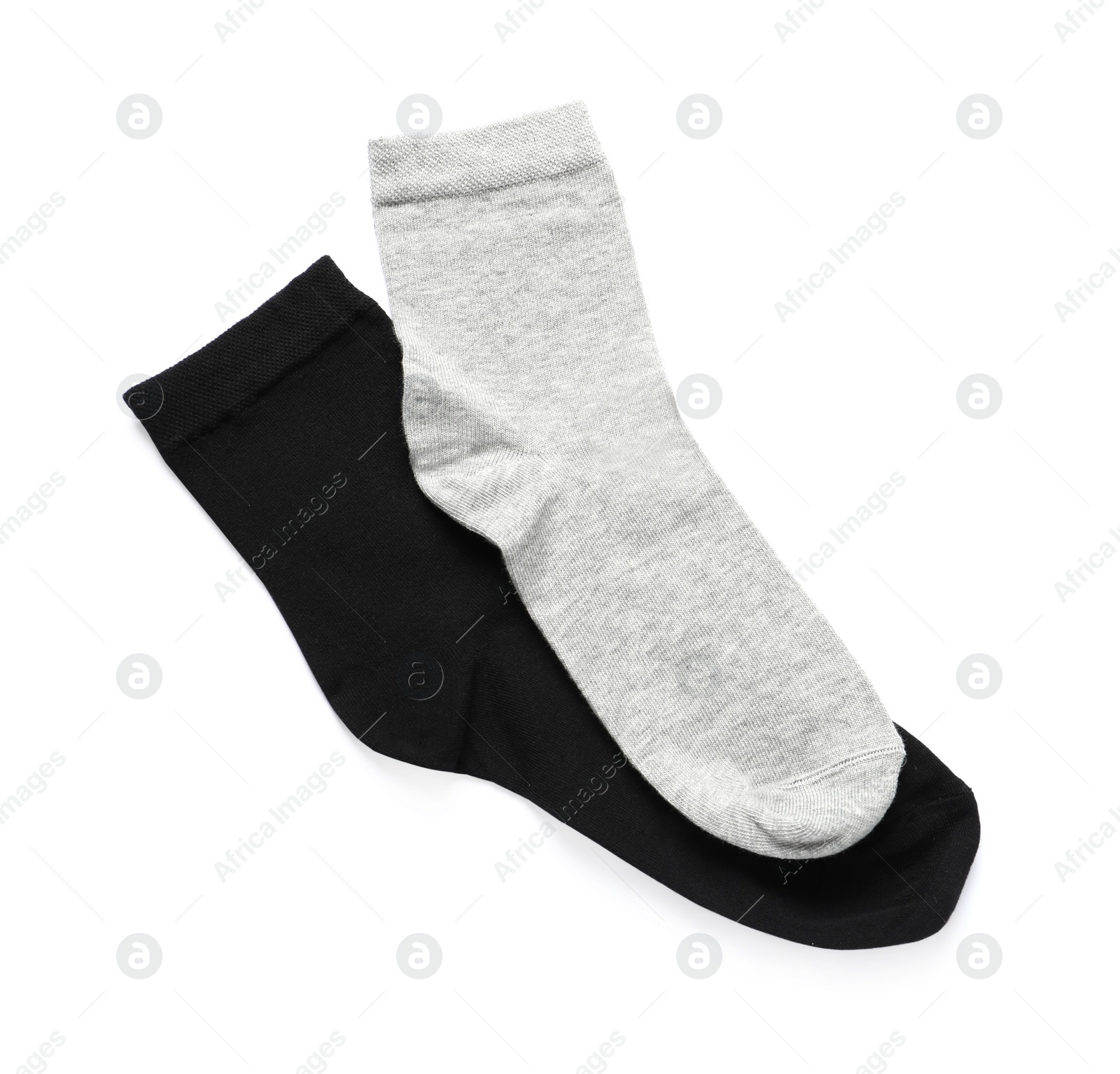 Photo of Different socks isolated on white, top view