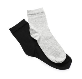 Different socks isolated on white, top view