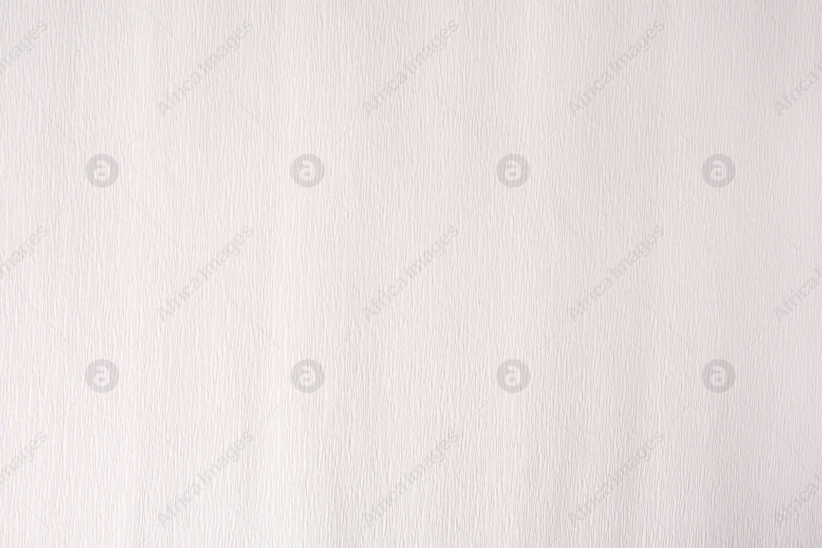 Photo of Texture of white paper sheet as background, closeup