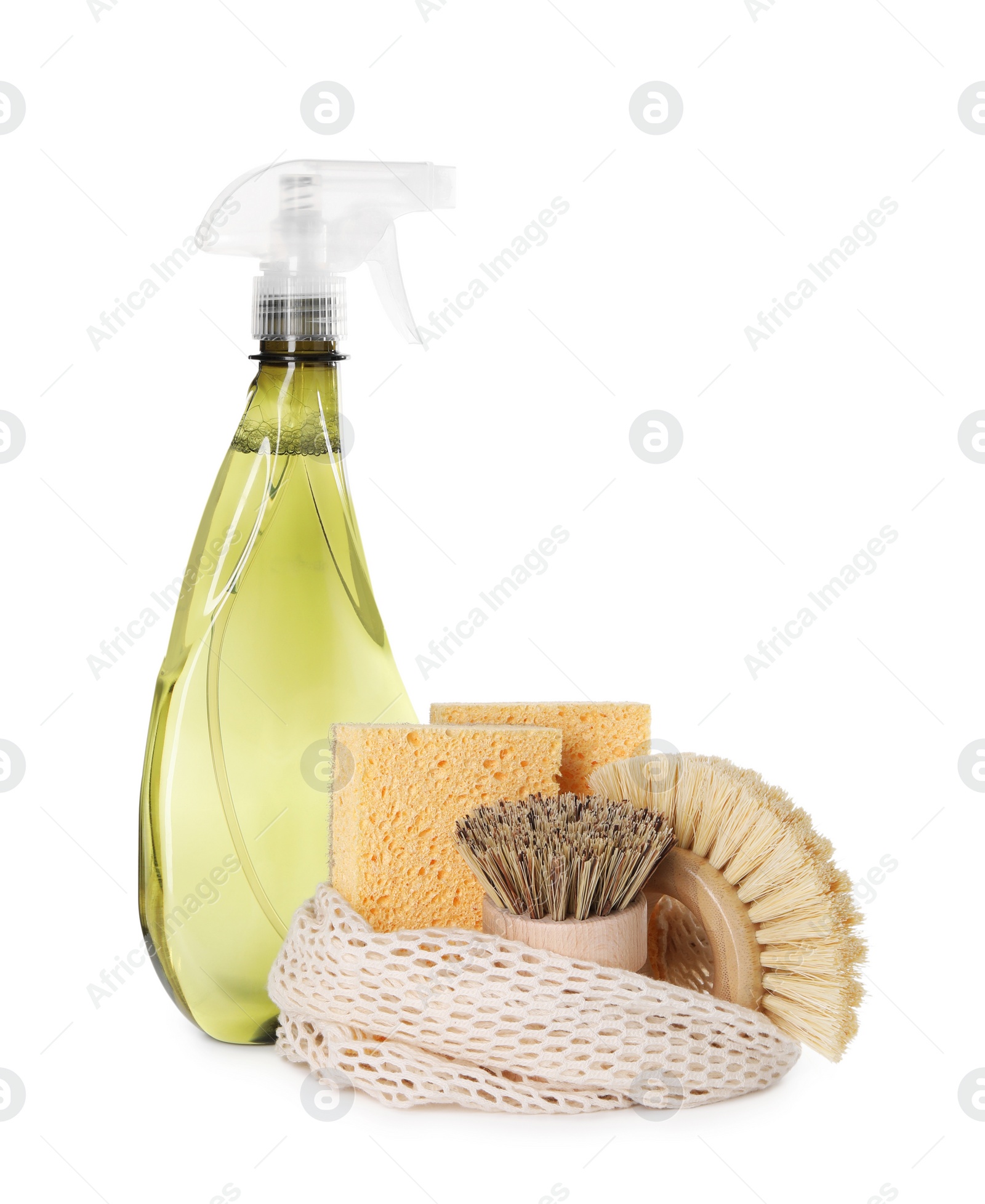 Photo of Spray bottle of cleaning product, brushes, sponges and net bag isolated on white