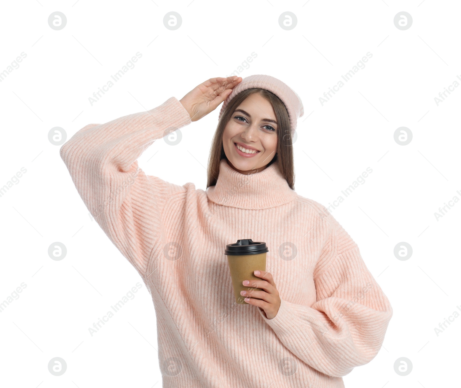 Photo of Happy beautiful woman with paper cup of mulled wine on white background