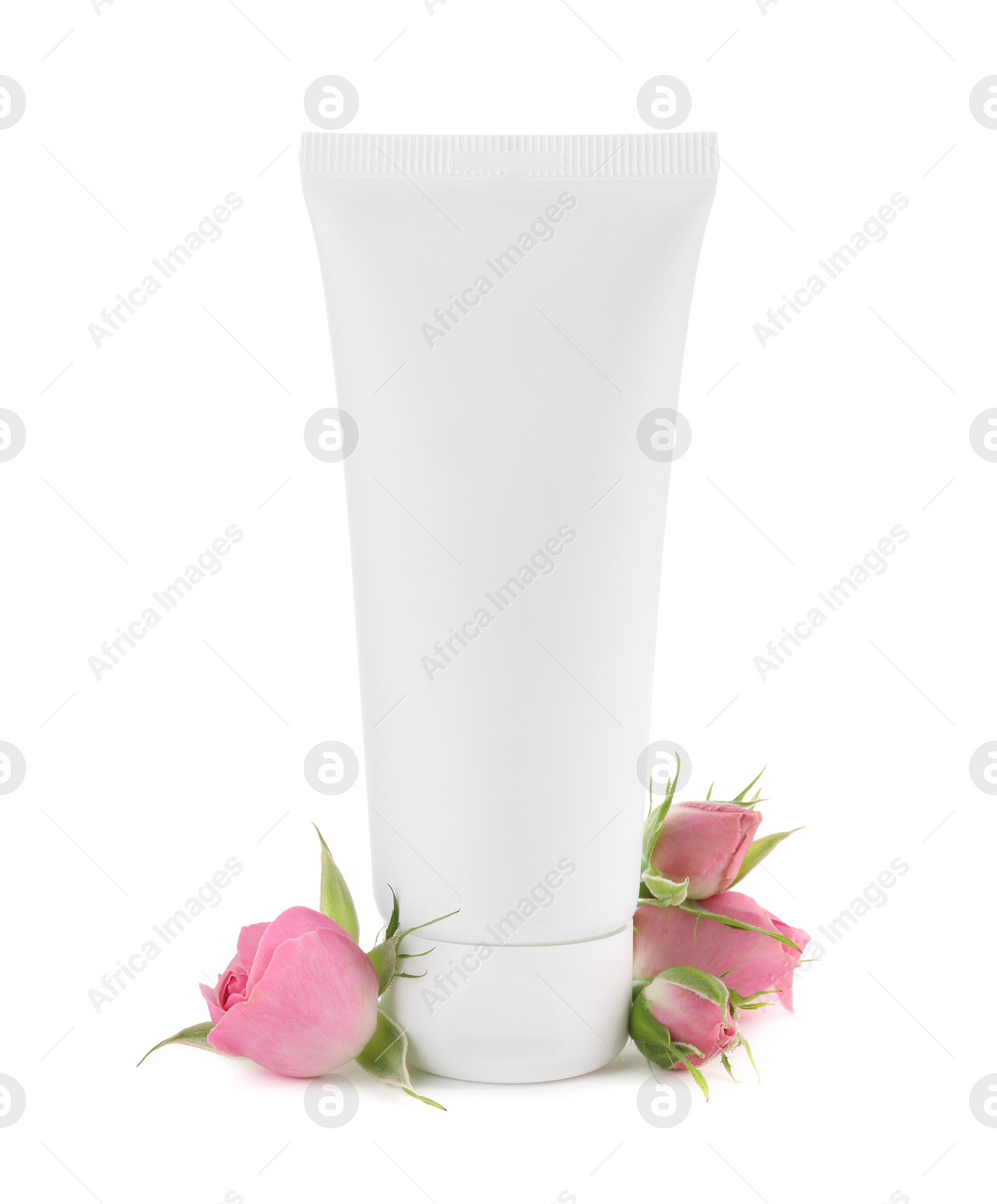 Photo of Tube of hand cream and roses on white background