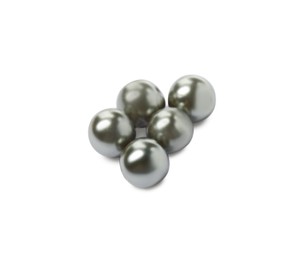 Photo of Many beautiful black oyster pearls on white background