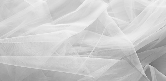 Image of Beautiful white tulle fabric as background, banner design