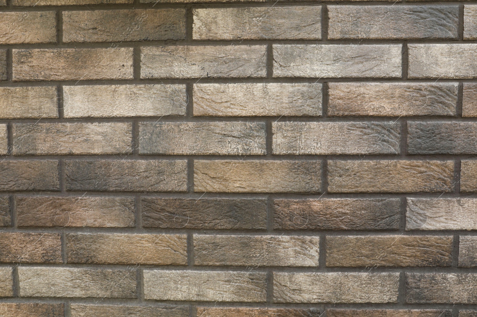 Photo of Texture of grey brick wall as background