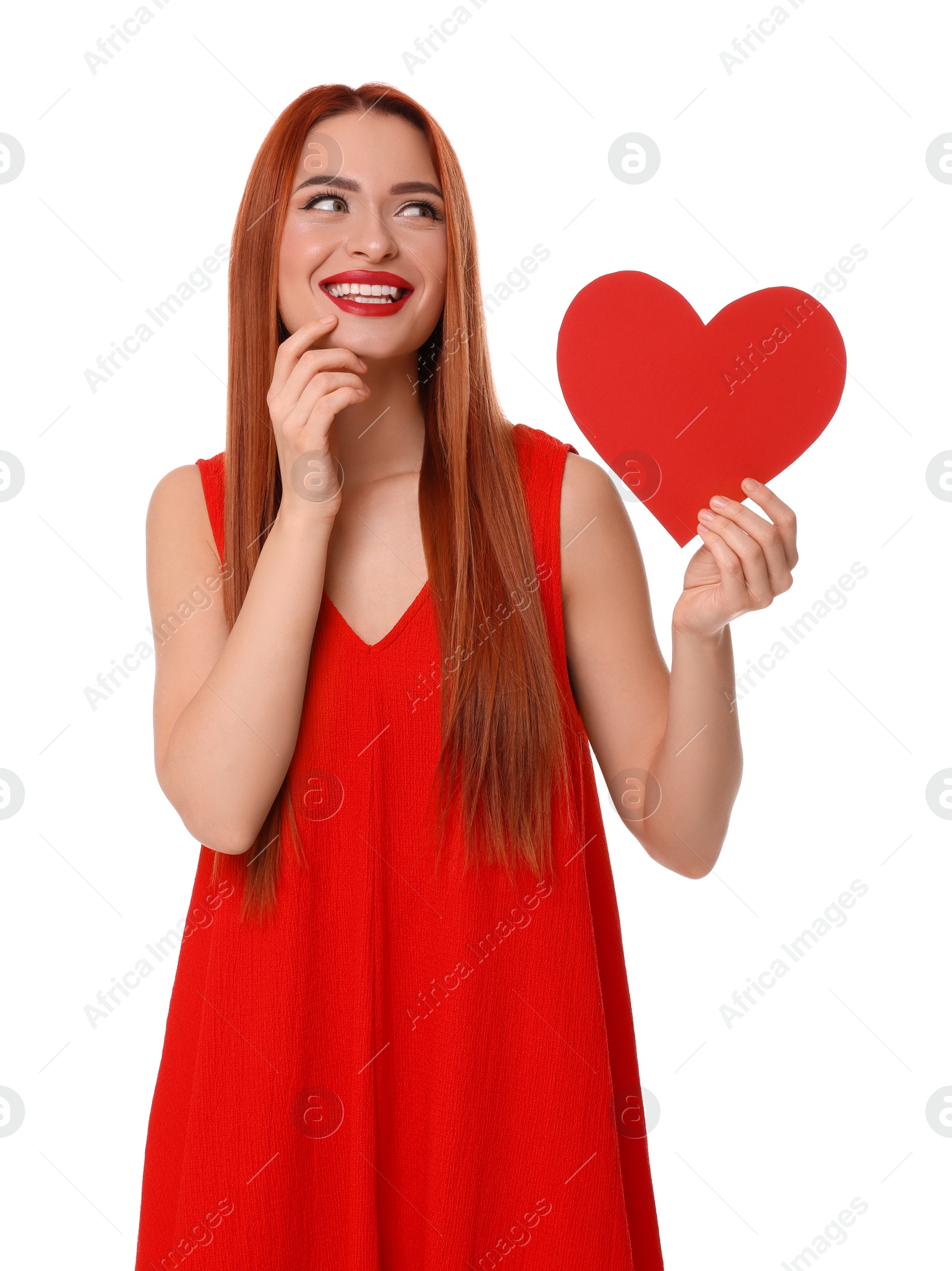 Photo of Young woman in red dress with paper heart on white background