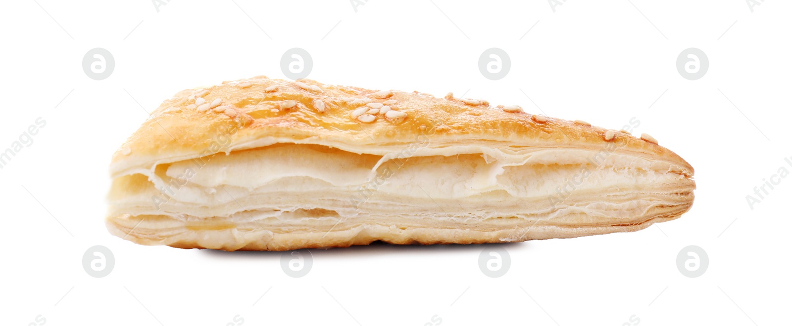 Photo of Puff pastry. One delicious fresh bun isolated on white