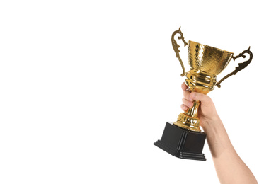 Man holding gold trophy cup on white background, closeup