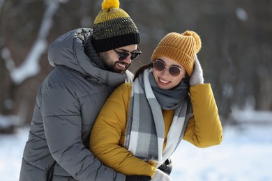 Photo of Beautiful happy couple outdoors on winter day