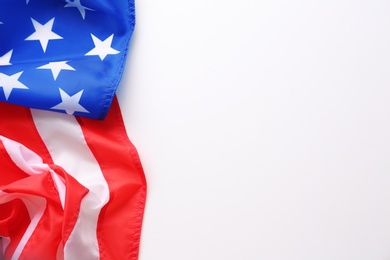 Photo of American flag on white background, closeup. National symbol