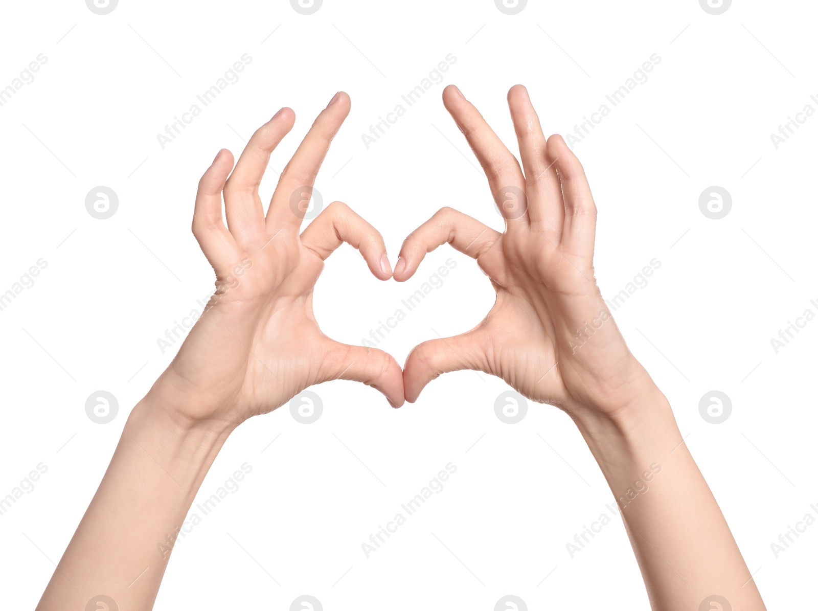 Photo of Woman showing heart on white background, closeup of hands