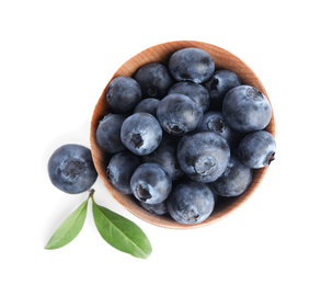 Fresh ripe blueberries in bowl on white background, top view