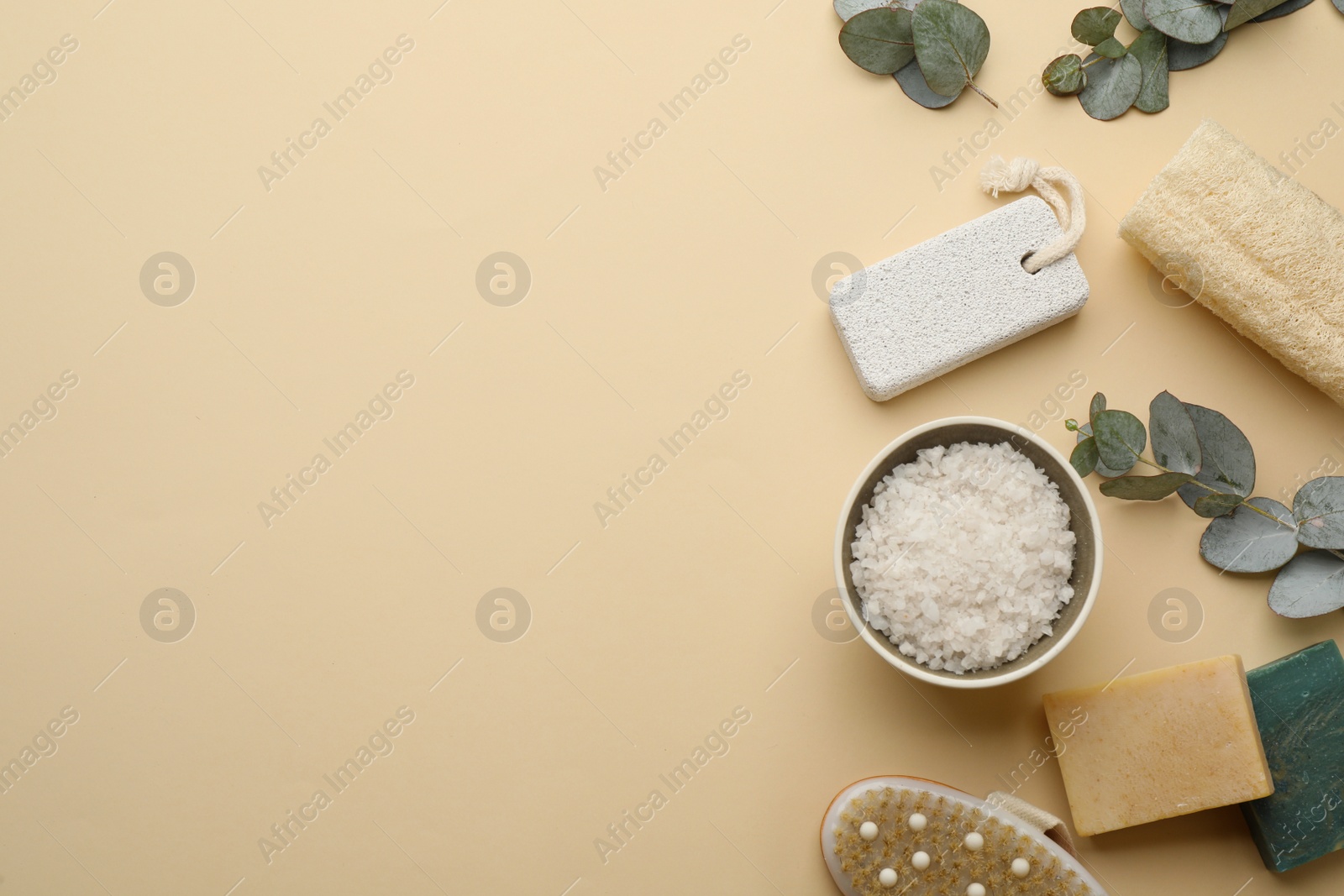 Photo of Flat lay composition with pumice stone on beige background. Space for text