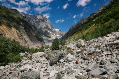 Picturesque view of mountains under cloudy sky