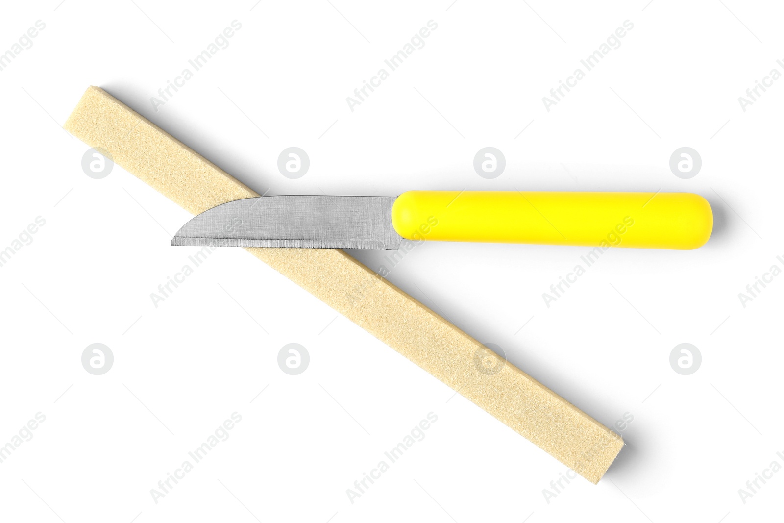 Photo of Paring knife and grindstone isolated on white, top view