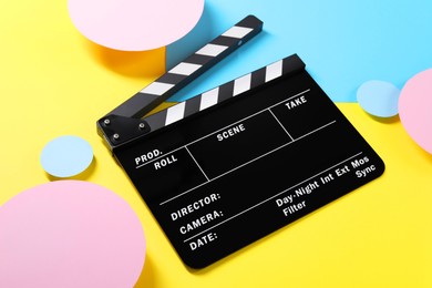 Photo of Clapperboard on color background, closeup. Film industry